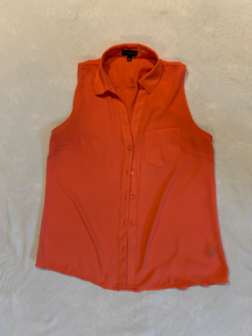 Limited Sleeveless Button-Down Shell
